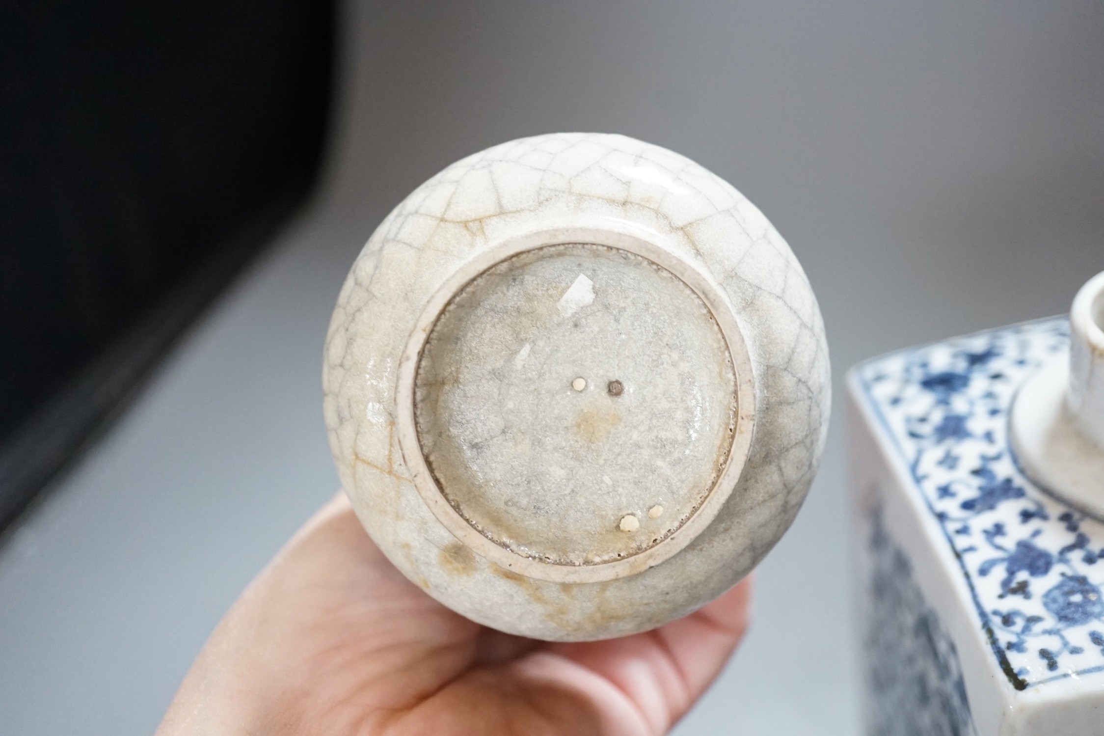 An 18th century Chinese provincial jar together with a tea canister and crackleglaze vase, tallest 18.5cm